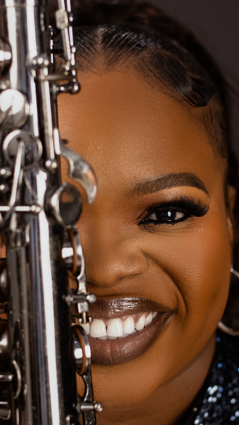 Funmisax with her saxophone